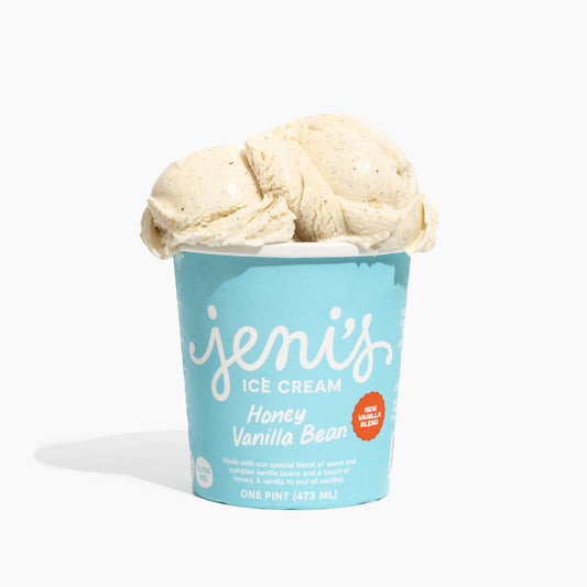 Pint of Jeni's Ice Cream with honey vanilla bean flavor on a white background